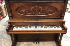 P.A. Starck upright piano- burl walnut veneer