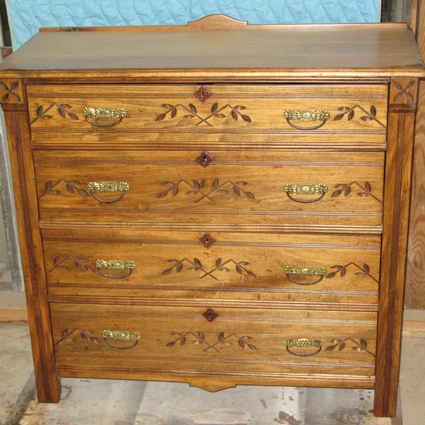 Refinished cabinet stained light brown