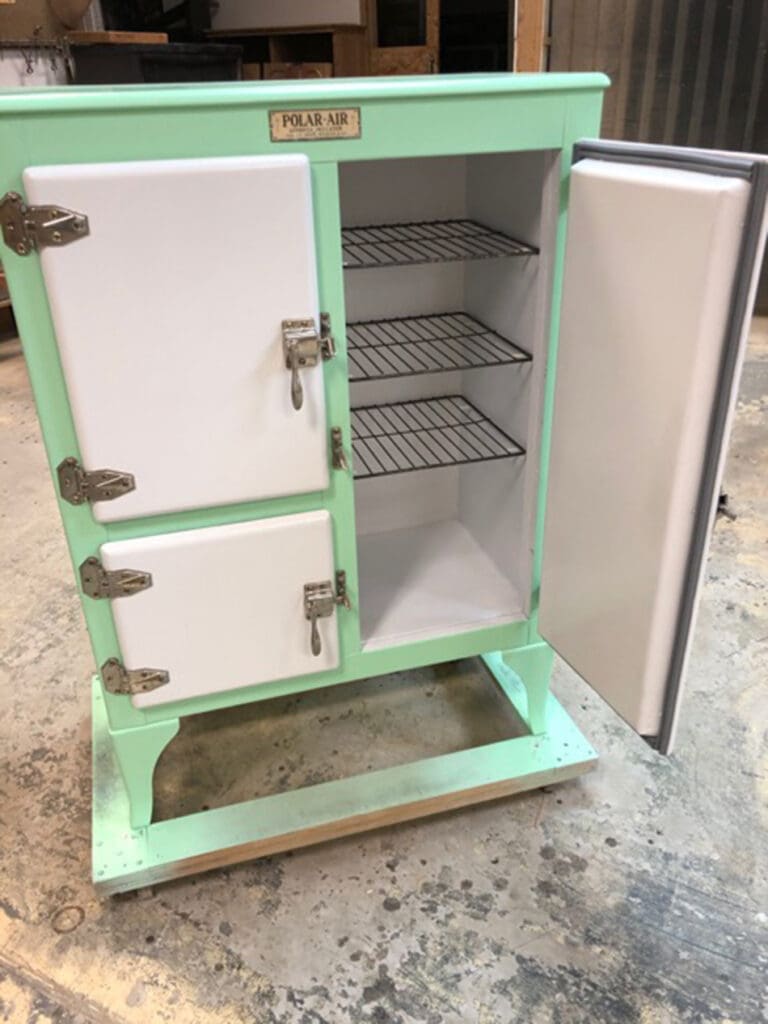 Vintage ice box with door open