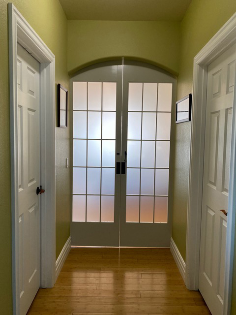Custom Built frosted glass doors in hallway