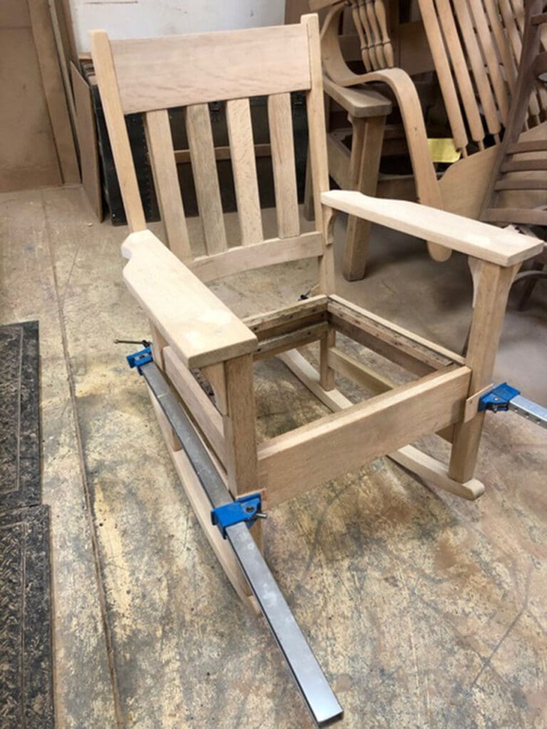 Fire damaged oak rocker stripped of previous finish